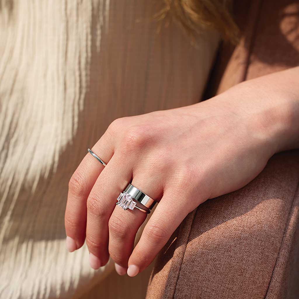 Three-Stone Setting with Emerald-Cut Side Stones