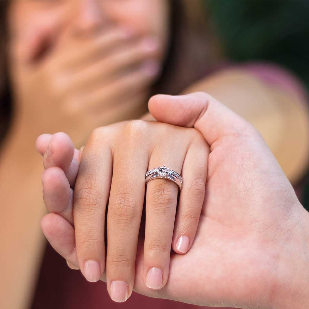 Modern six-prong engagement ring setting with substantial gold band