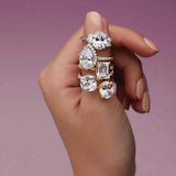 Three-stone half-moon engagement ring in 14K gold, diamond center, overhead