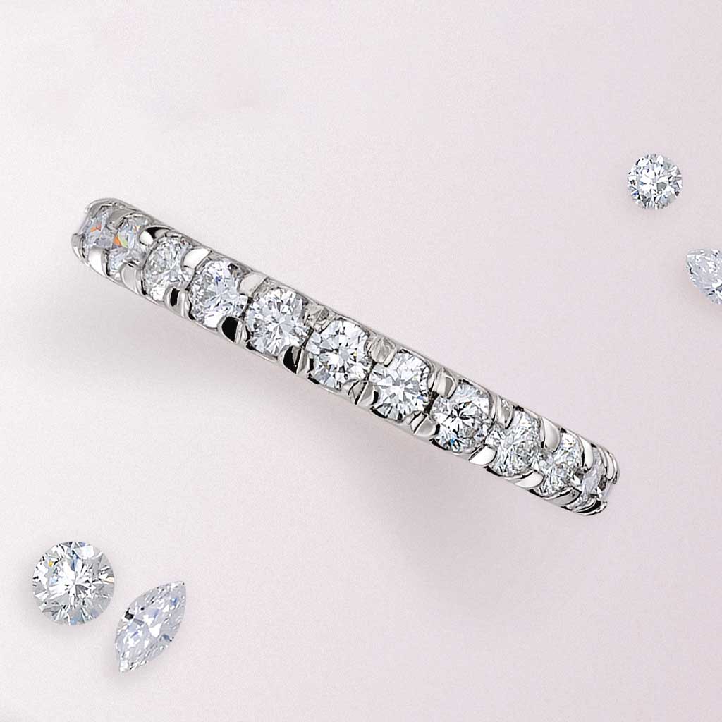 French-set diamond eternity band in 14K gold, product view showing continuous diamond circle