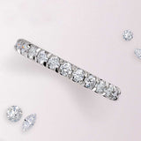 French-set diamond eternity band in 14K gold, product view showing continuous diamond circle