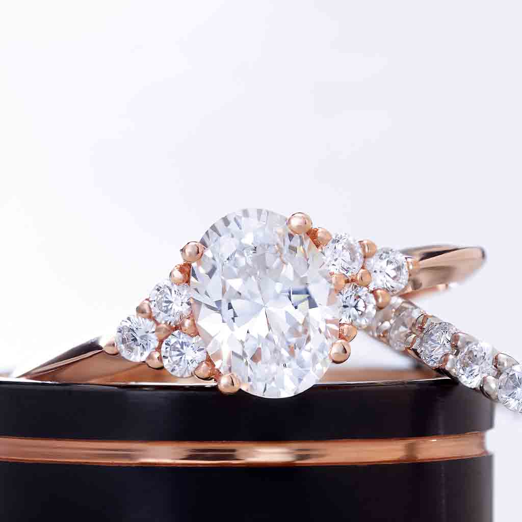 Diamond cluster engagement ring setting with round accent diamonds