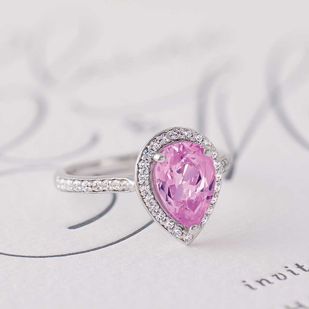 Diamond halo engagement ring setting in 14K white gold