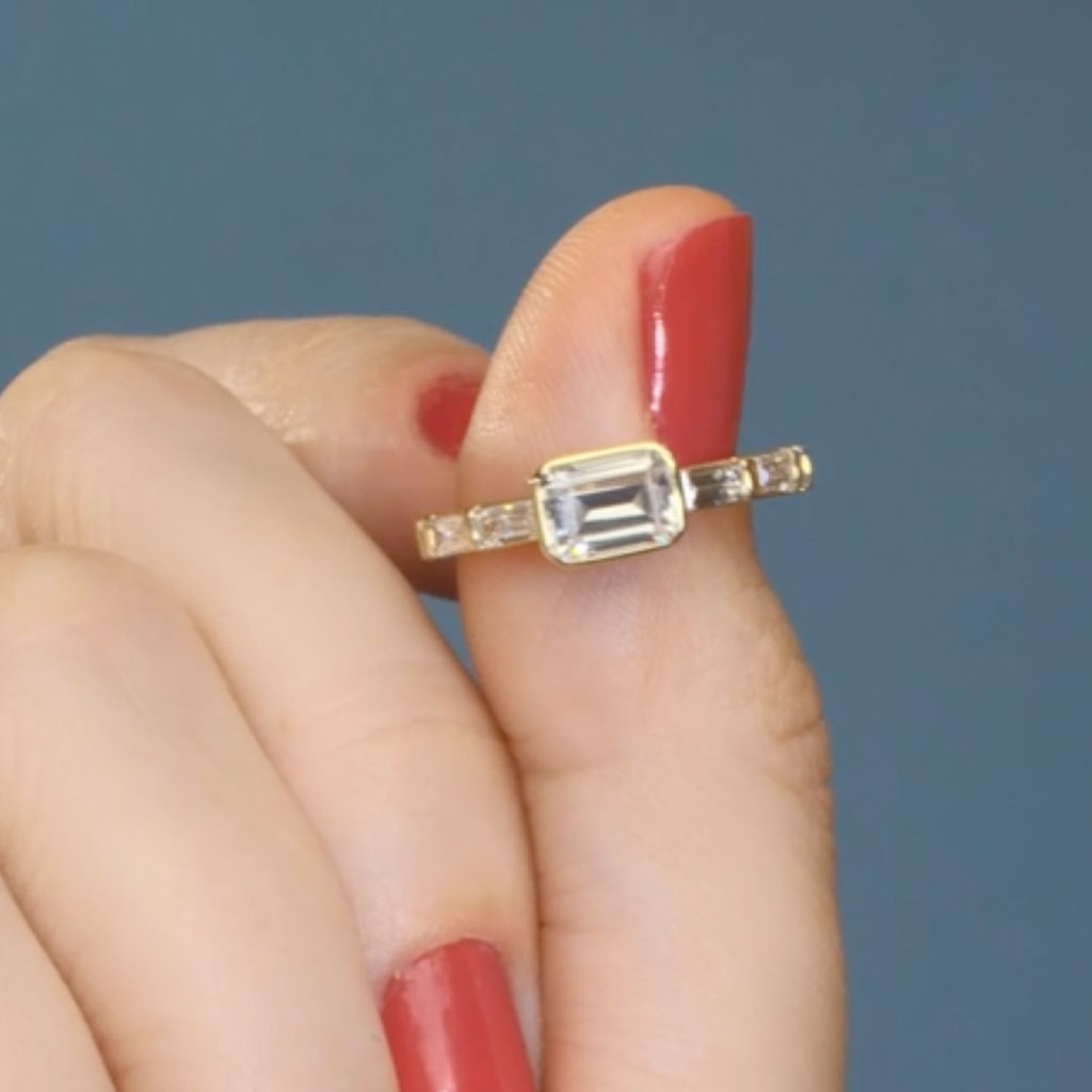 Modern East West engagement ring with baguette diamonds