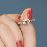 Modern East West engagement ring with baguette diamonds