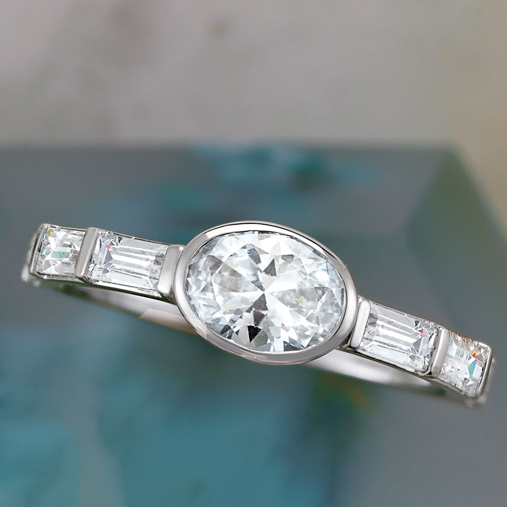 Bezel-set East West engagement ring setting in 14K gold