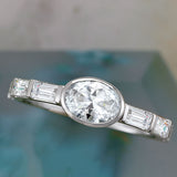 Bezel-set East West engagement ring setting in 14K gold