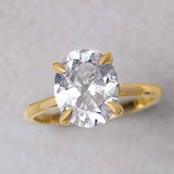 Claw-prong diamond solitaire engagement ring setting in 14K yellow gold