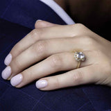 Scalloped halo diamond engagement ring in 14K gold, diamond center, three-quarter angle