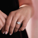 Modern cluster engagement ring setting with side diamonds