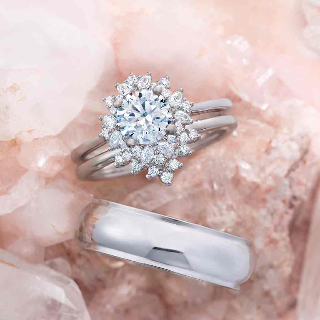 Floral halo engagement ring with oval center stone in 14K gold, product view