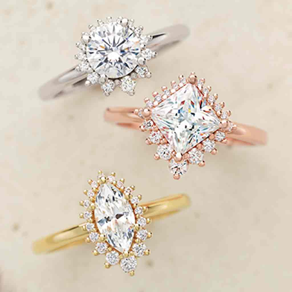 Saddle halo diamond engagement ring setting in 14K gold, diamond center, on hand