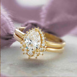 Saddle halo diamond engagement ring setting in 14K gold, diamond center, front view