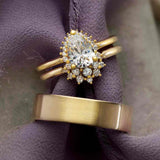 Saddle halo diamond engagement ring setting in 14K gold, diamond center, side profile