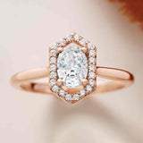 Vintage diamond halo engagement ring in 14K gold, diamond center, front view