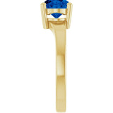 Oval sapphire cocktail ring in 14K rose gold, overhead view of oval-cut stone