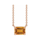 Modern 14K rose gold necklace featuring vertical emerald-cut citrine gemstone for birth month elegance