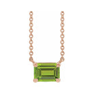 Handcrafted vertical peridot gemstone necklace in polished 14K rose gold‚Äîa modern birthstone keepsake