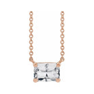 Emerald-cut white sapphire birthstone necklace set in 14K rose gold with vertical minimalist pendant design