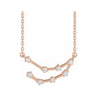 Minimalist Capricorn necklace featuring pave diamond constellation in solid gold