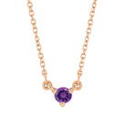 Tiny birthstone pendant in 14K rose gold with a faceted amethyst center for subtle sparkle.
