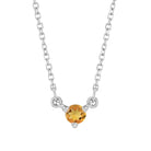 Minimalist 14K gold necklace with a small round citrine gemstone pendant.