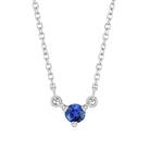Handcrafted 14K white gold necklace showcasing a brilliant sapphire gemstone accent.