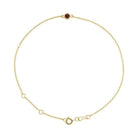14K yellow gold Garnet bracelet featuring a bezel-set birthstone creating the most adorable birthstone bracelet