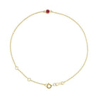 14K yellow gold Ruby bracelet featuring a bezel-set birthstone creating the most adorable birthstone bracelet