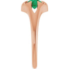 Emerald belcher-set cocktail ring in 14K rose gold, handmade with recycled gold and eco-friendly gemstones.