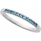 December birthstone band with Swiss blue topaz in white gold