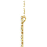 diamond cross pendant necklace in solid 14k yellow gold side view