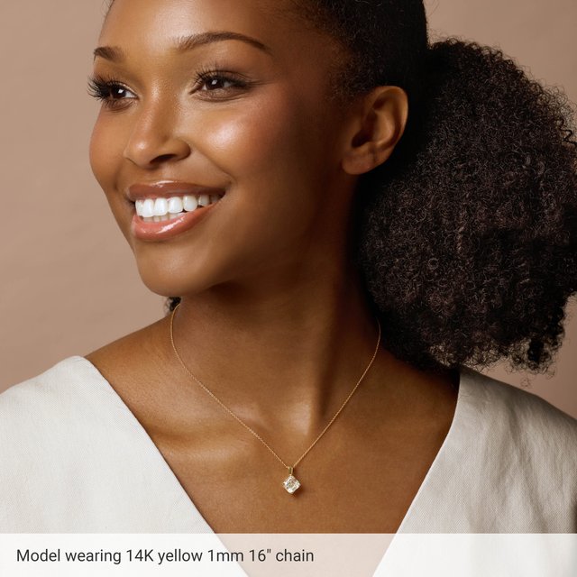 Classic cable chain necklace shown with a pendant on model