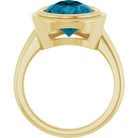 Large London blue topaz gemstone ring, bezel-set in sustainable 10K gold