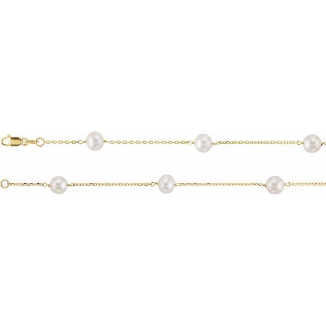 Pearls by the yard necklace in 14K gold with 14 station pearls, front view