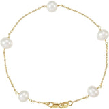 Pearl station bracelet in 14K gold with five luminous pearls, front view