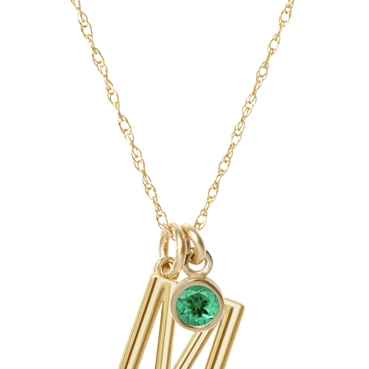 Customizable initial and birthstone necklace shown in 14K yellow gold with M and emerald