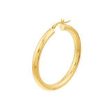 Flat lay of polished 4mm wide gold tube hoop earrings variant--14K-yellow-gold variant--40mm