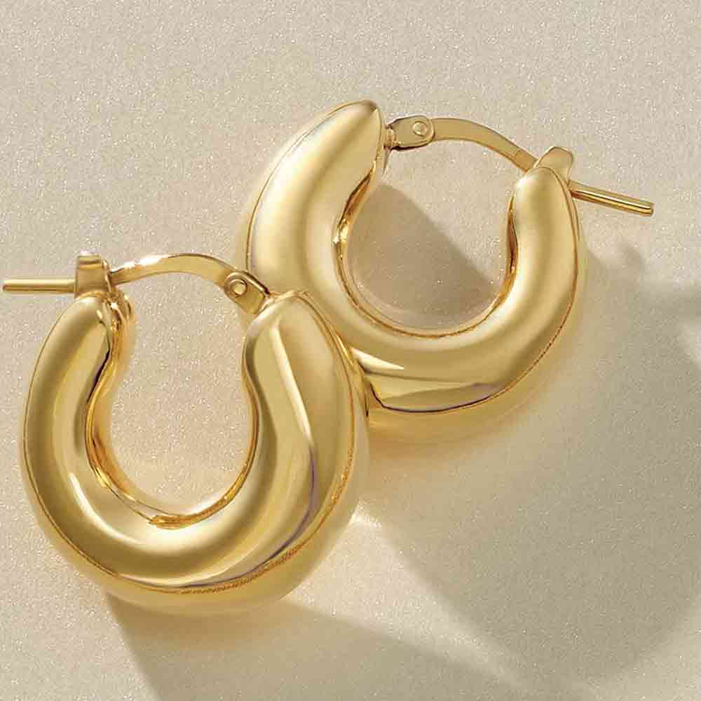 Solid 14K gold huggy hoop earrings, product front view