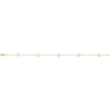 Pearl station bracelet in 14K gold, close-up of pearl and chain detail