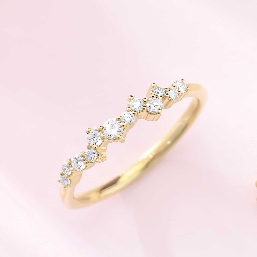 Scattered diamond band in 14K gold, front view