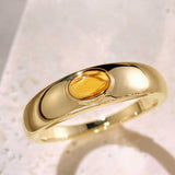 Gemmy dome ring with cabochon gemstone in 14K gold, front view