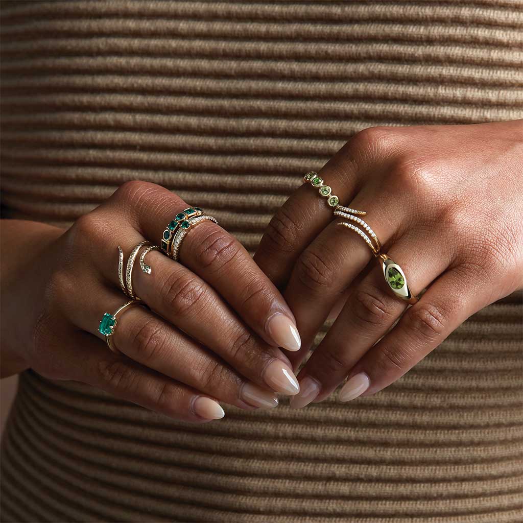 Peridot cocktail ring on model hand showing scale and fit