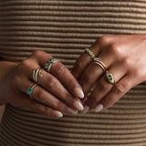 Peridot cocktail ring on model hand showing scale and fit