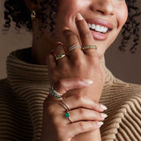 Peridot cocktail ring in 14K gold, angled view showing teardrop stone