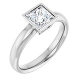 Minimalist bezel engagement ring with wide gold band