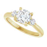 Three-stone engagement ring with round side stones in 14K gold, diamond center, close-up of round side stones variant--Cushion variant--1CT variant--14K-yellow-gold