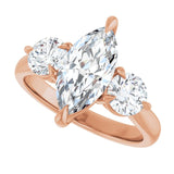 Three-stone engagement ring with round side stones in 14K gold, diamond center, three-quarter angle variant--Marquise variant--2CT variant--14K-rose-gold