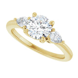 Three-stone engagement ring with pear side stones in 14K gold, diamond center, on hand variant--Round variant--1CT variant--14K-yellow-gold