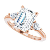 Three-stone engagement ring with pear side stones in 14K gold, diamond center, three-quarter angle variant--Emerald variant--3CT variant--14K-rose-gold